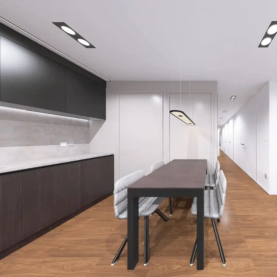 jadalnia-aneks-kuchenny-minimalizm-bydgoszcz Minimalistyczna jadalnia połączona z aneksem kuchennym, białe krzesła i ciemne fronty, urządzanie mieszkania Bydgoszcz