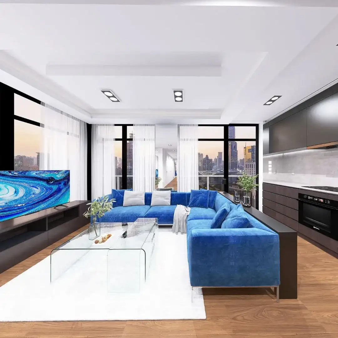 niebieska-sofa-otwarta-kuchnia-wystroj-bydgoszcz Salon z niebieską narożną sofą i otwartą kuchnią, stylizacja wnętrz apartamentu w Bydgoszczy